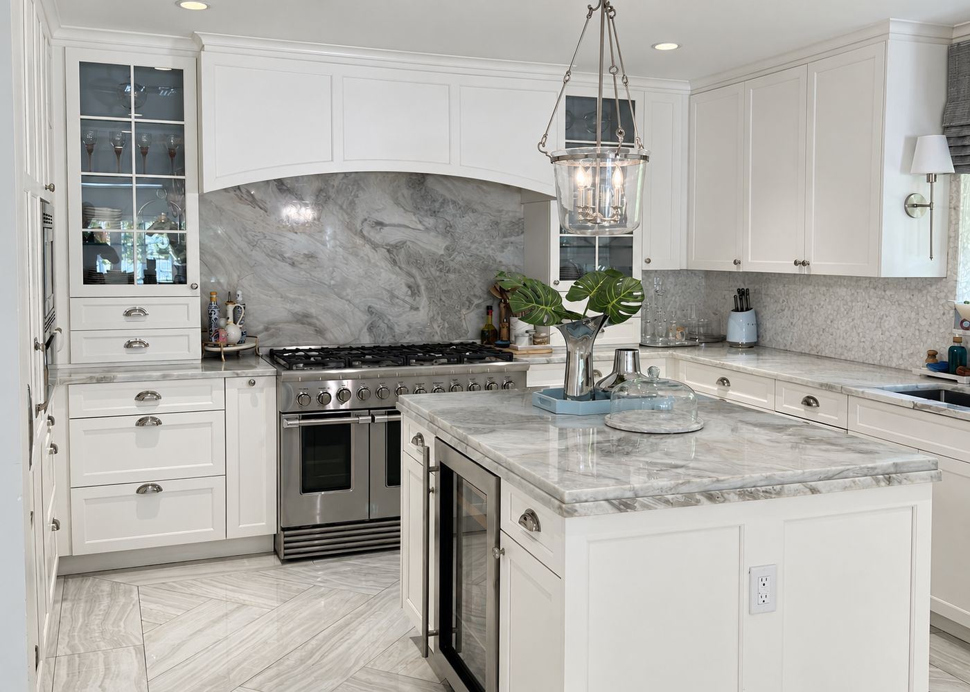 White kitchen with marble backsplash and island, kitchen remodel by MySFContractor