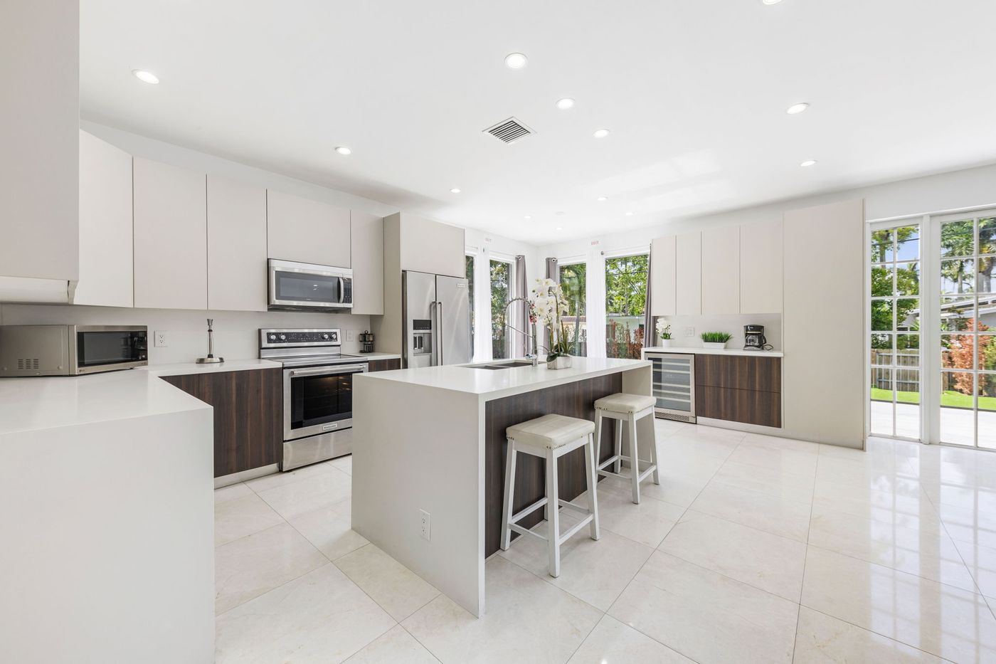 White kitchen with stainless steel appliances, kitchen remodel by MySFContractor