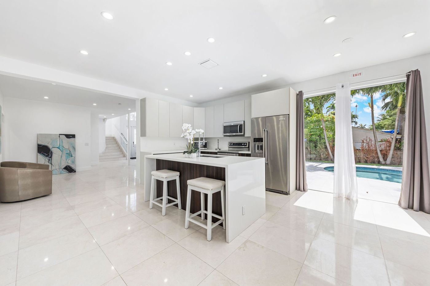 Kitchen island with pool view, kitchen remodel by MySFContractor