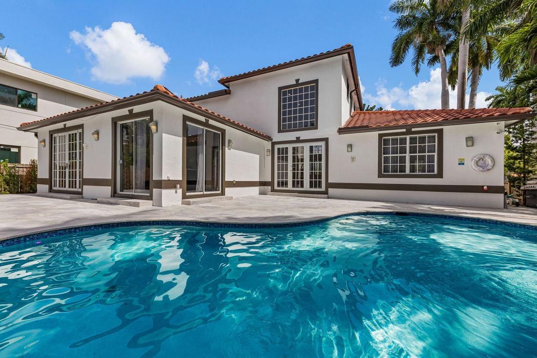 Backyard pool and patio renovation at a South Florida home by MySFContractor