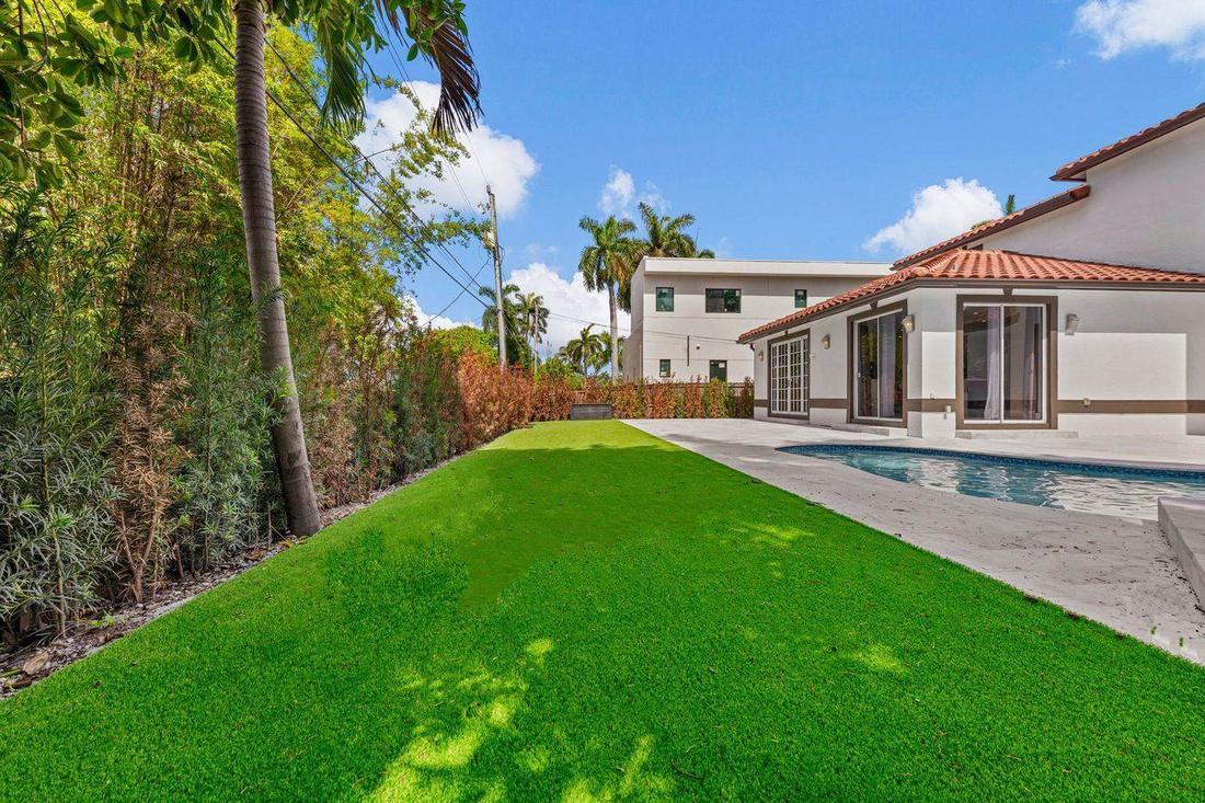 Landscaped backyard and pool area, exterior renovation by MySFContractor