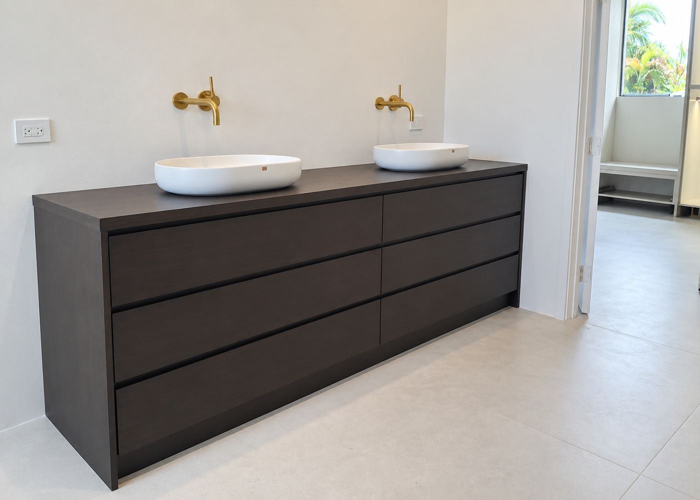 Dark wood vanity with dual vessel sinks, bathroom remodel by MySFContractor