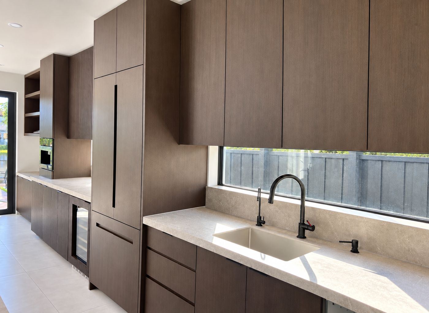 Dark cabinetry kitchen sink area, kitchen remodel by MySFContractor